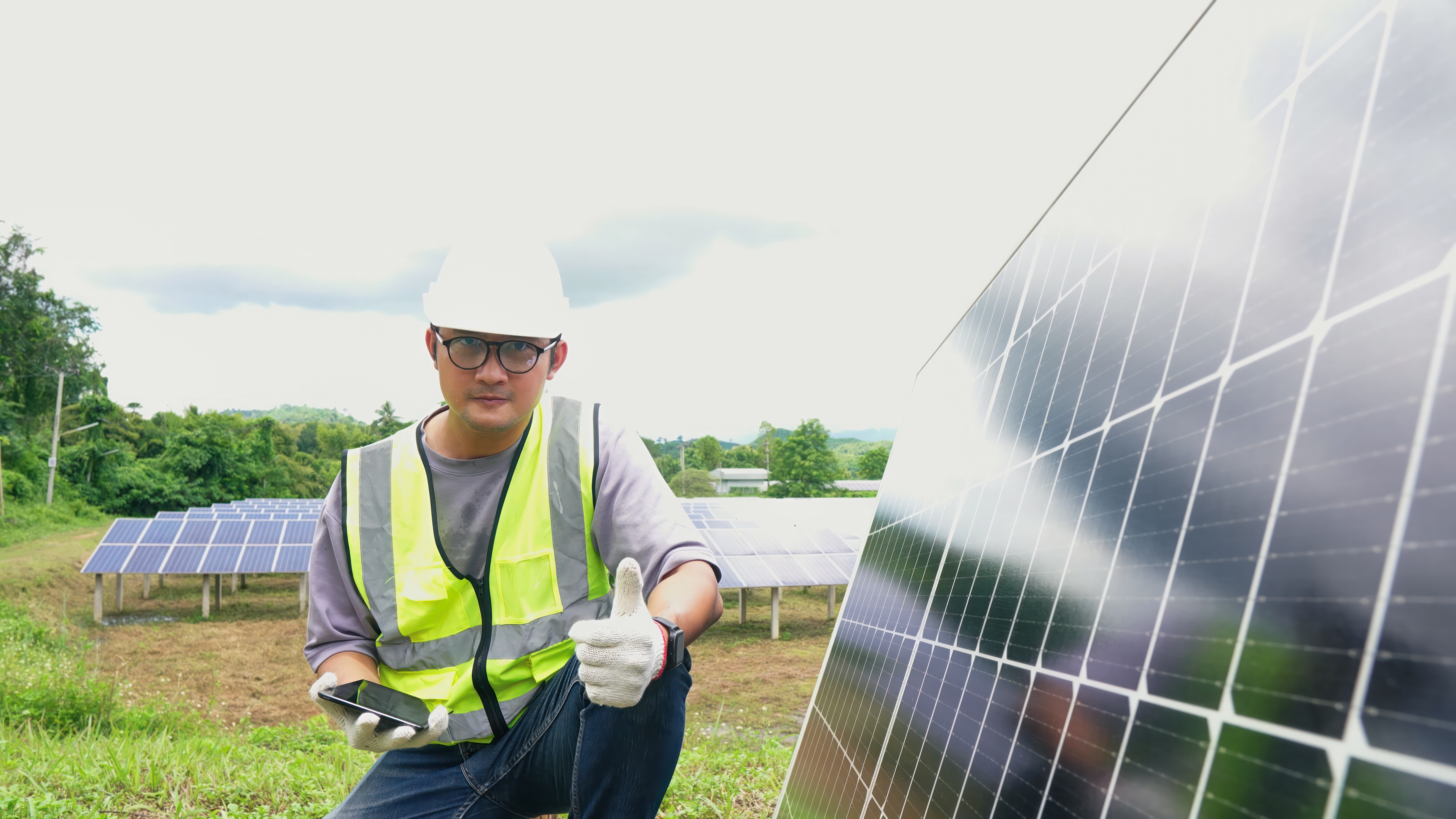 asian man engineer using digital tablet maintaining solar cell p
